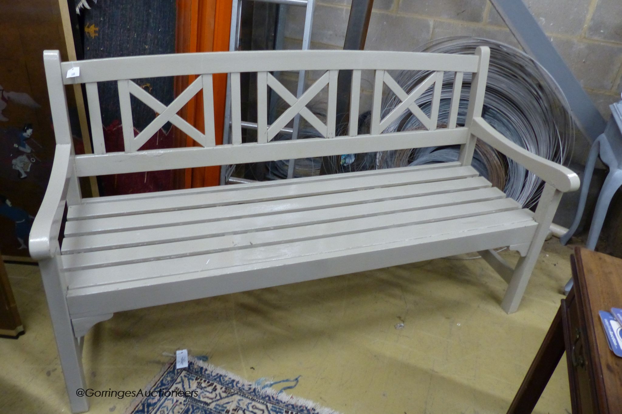 A painted teak garden bench, length 158cm, depth 58cm, height 92cm